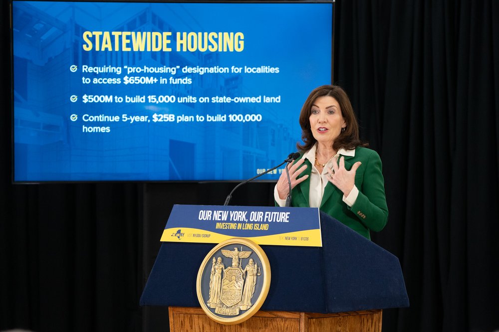 Gov. Kathy Hochul gives a presentation on her housing plan.