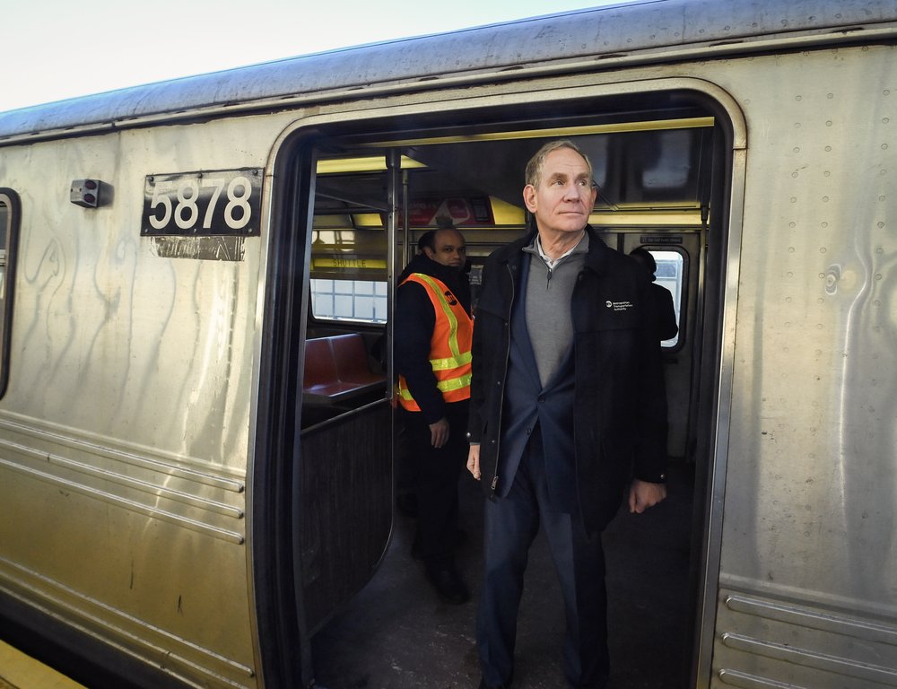 MTA Chair Janno Lieber stands inside a subway car.