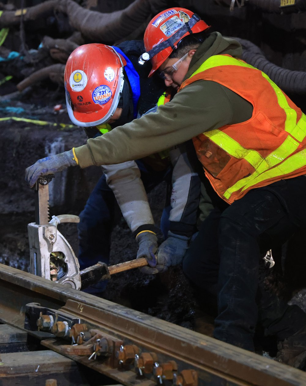 After the track is laid, crews use a track jack to precisely align the rail before fastening it in place. The Port Authority says maintaining the correct gauge—the space between rails—is crucial for safe train operations, as even a slight deviation can cause operational issues.