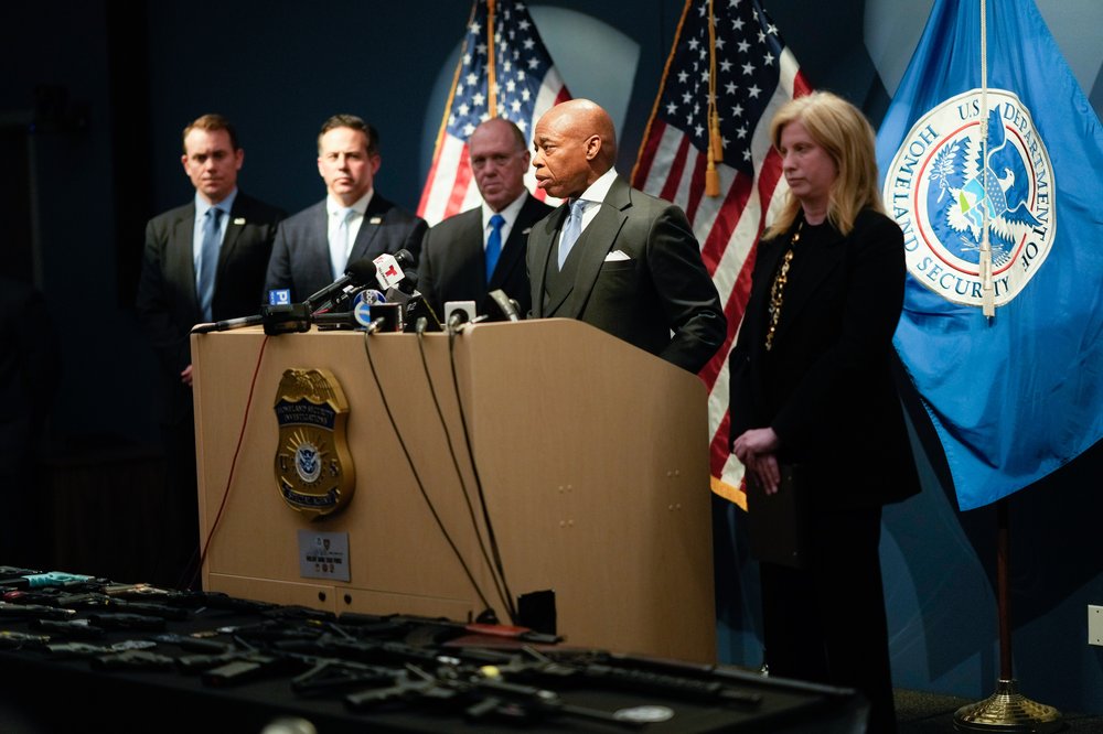 Adams speaking at the press conference Tuesday.