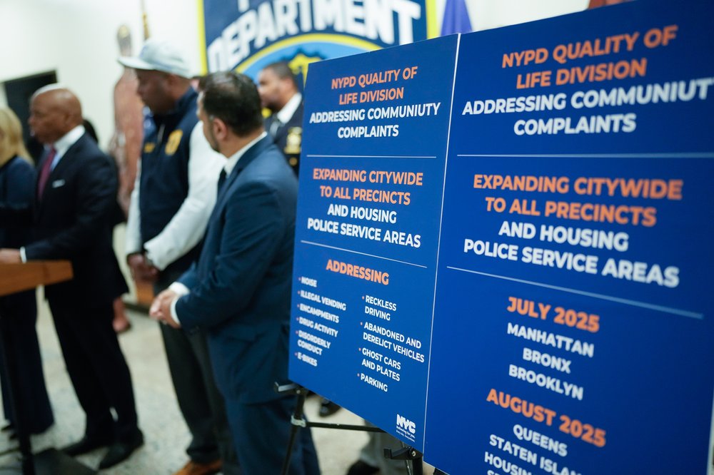 Mayor Eric Adams and NYPD leaders announce the citywide rollout of quality-of-life policing at a press conference in June 2025.