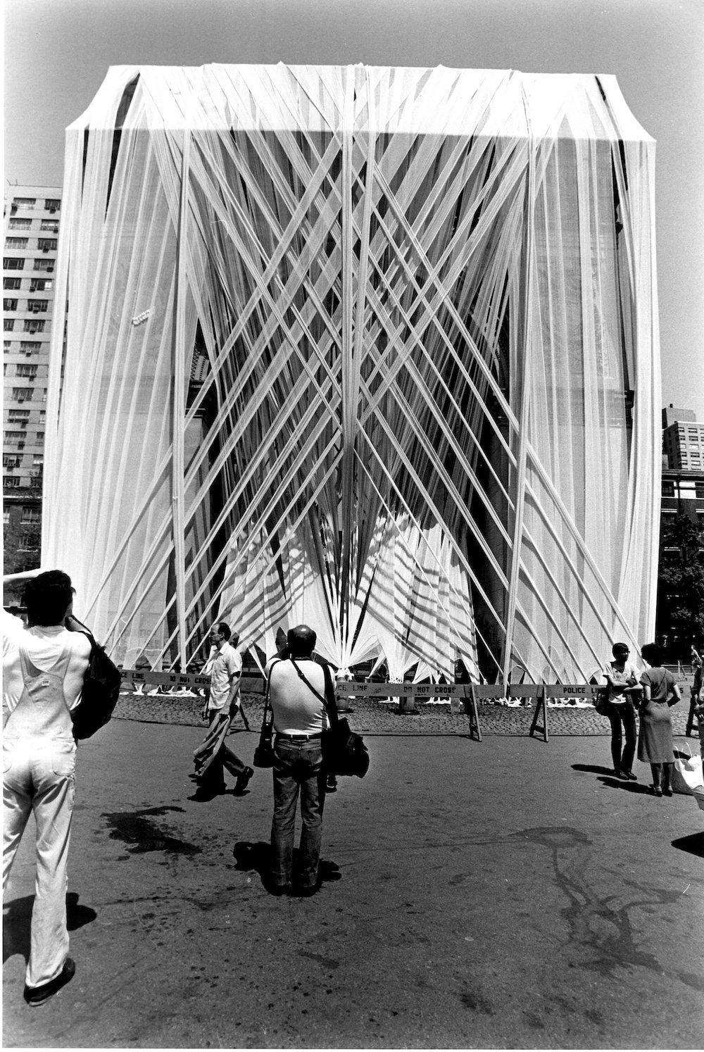 54958064813francis-hines-washington-square-arch-wrap-1980-1-jpg.jpeg Francis Hines, Washington Square Arch Wrap, 1980, Washington Square Park, Manhattan, NYC Parks Photo Archive. In 1980 Francis Hines bound the iconic Washington Square Arch in strips of fabric, described as a giant bandage for a wounded monument. Sponsored by NYC, the installation was used to raise funds to restore the monument and park.<br/>
