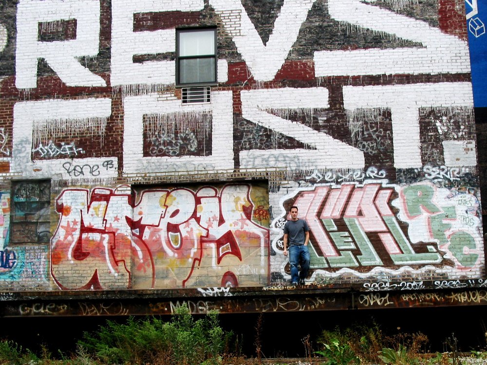 56499096f2002g-jpg.jpeg Spring 2002: this is the famous Revs/Cost wall at 23rd Street, which you can still see (although it was largely buffed in 2009 by construction crews that didn't realize its historical importance.) Only the upper part of the wall was visible from street level. (L05 ICF)