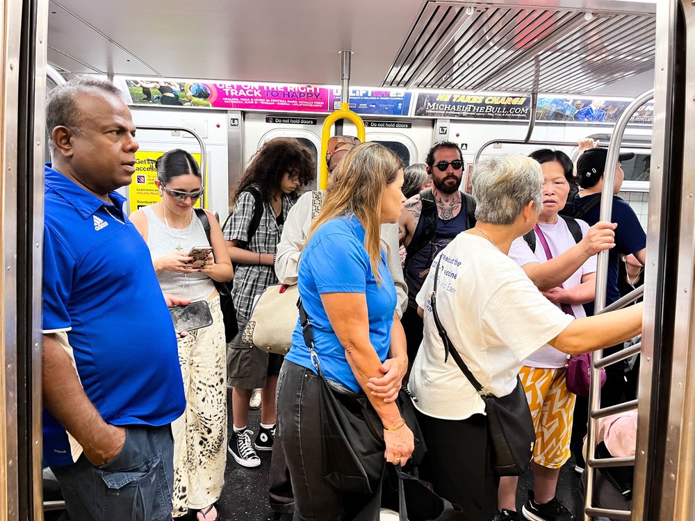 Subway riders stuck on an F train at West Fourth Street on July 31, 2025.