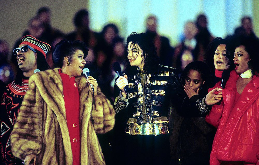 5758f5b3dshutterstock_3645880h-jpg.jpeg Stevie Wonder, Franklin, MIchael Jackson, and Diana Ross perform at President Clinton's inaugural gala in 1993 (Mark Reinstein/Shutterstock)