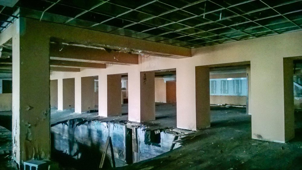 The floor has caved in completely in this dining area.
