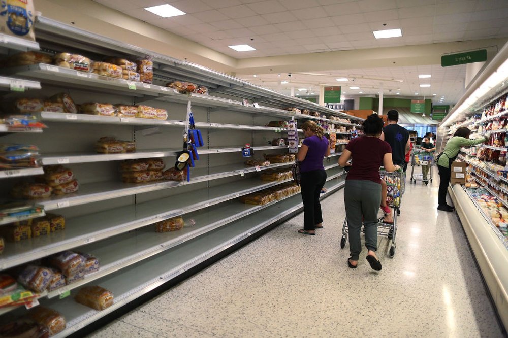 5f7c3abe8gettyimages-843059152-jpg.jpeg Nearly empty shelves are seen as people stock up on bread in preparation for Hurricane Irma on September 5, 2017 in Homestead, Florida. (Getty Images)