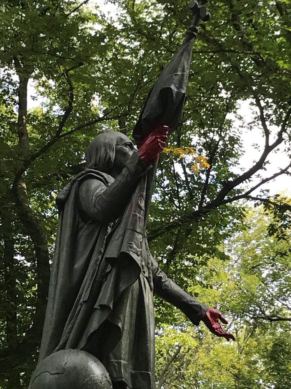 5fda42142col5-jpg.jpeg The paint remains on the statue's hands, but the graffiti was removed from the base (Danielle Barnes / DNAinfo)