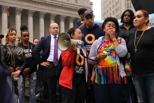 Melani Brown, Polanco's sister, speaks to the crowd at Foley Square.