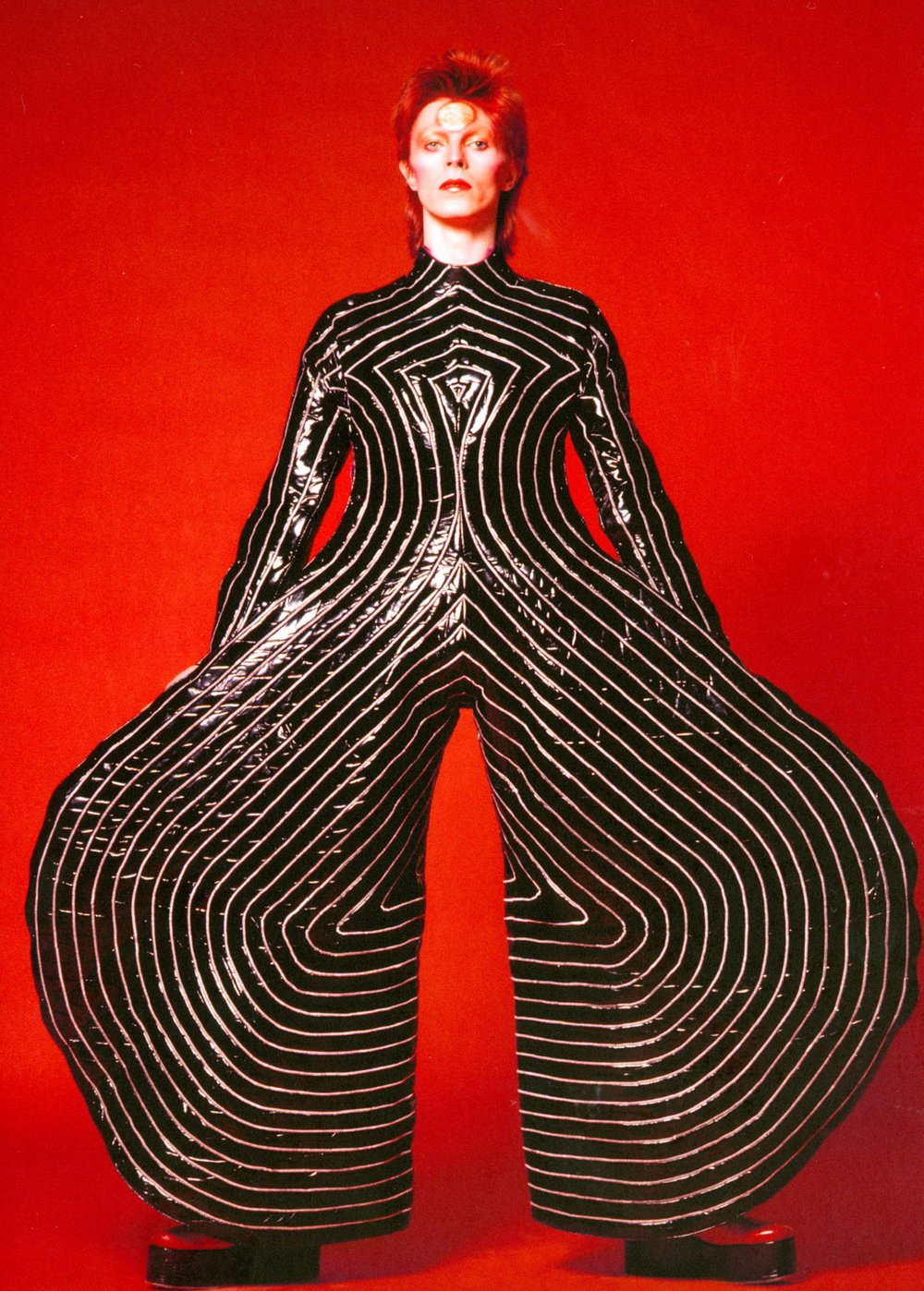 61132e152striped_bodysuit_for_aladdin_sane_tour_1973_sukita_the_david_bowie_archive_2012-1-jpg.jpeg