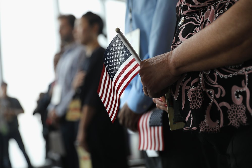 6133beb67gettyimages-831851922-jpg.jpeg New Americans take part in a naturalization ceremony held in the observatory of the One World Trade Center<br>