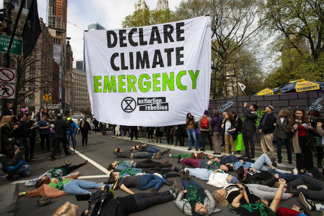 Climate change protesters are arrested in New York City in April