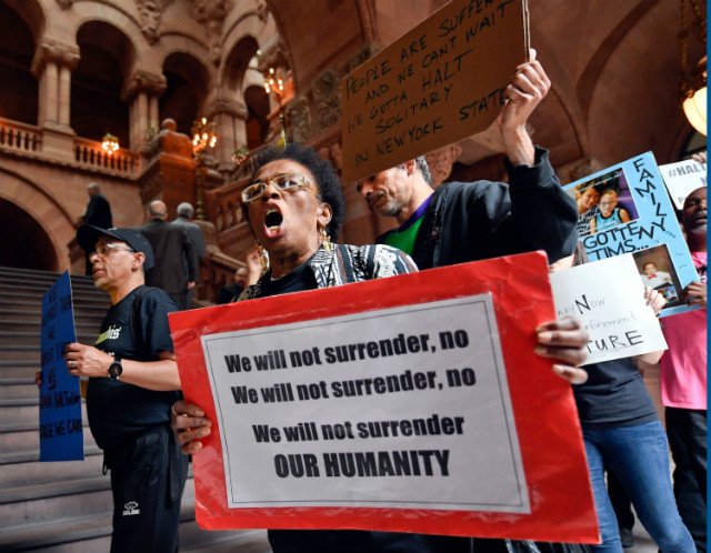 Nathylin Flowers marches with protesters against solitary confinement at New York state correctional facilities, during a rally to urge New York state legislators to pass reform legislation at the state Capitol, in Albany on Wednesday
