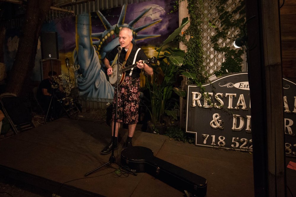 6407e6e5cimg_7955-jpg.jpeg Robert Coover performed an original song about being "in the subway at 3 a.m., and you've been there about half an hour and you're ready to vomit, and you just want anything to show up and take you in any direction."<br>