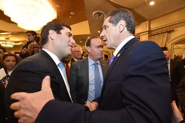 Governor Andrew M. Cuomo delivers remarks at a meeting of the Long Island Association in Woodbury, Long Island in February. Jay Jacobs is at center.
