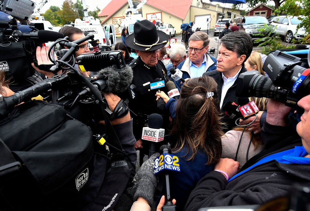 66fc54dd8shutterstock_9918339d-jpg.jpeg Schoharie County Sheriff Ronald Stevens,left, New York State Sen. James Seward,center, and Rep. John Faso, R-N.Y.,speak to reporters at the scene of Saturday's fatal limousine crash in Schoharie, N.Y., . A limousine loaded with revelers heading to a 30th birthday slammed into an SUV parked outside a store, killing all people in the limo and two pedestrians.<br>