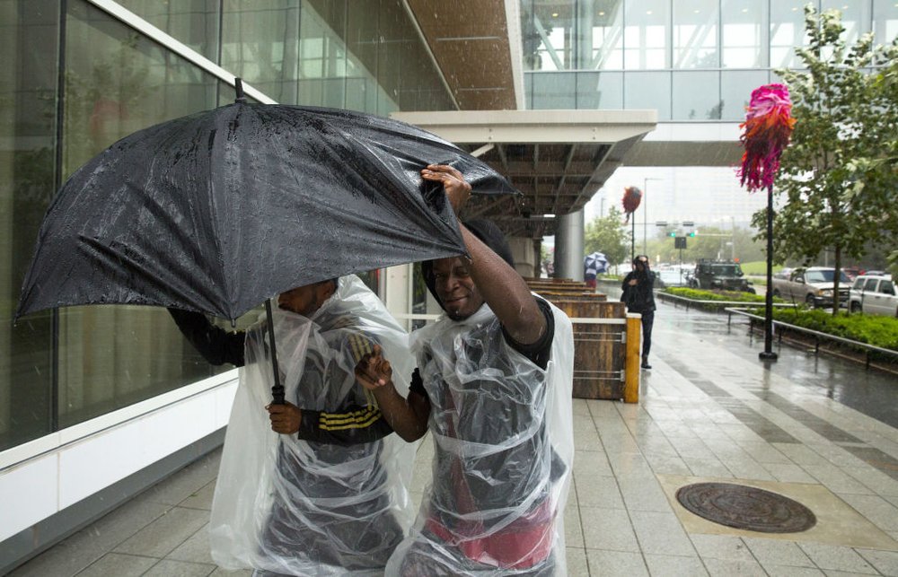 672c01d9bgettyimages-840315174-jpg.jpeg Evacuees fight the rain outside the George Brown Convention Center which has been turned into a shelter run by the American Red Cross to house victims of the high water from Hurricane Harvey on August 28, 2017 in Houston, Texas<br>
