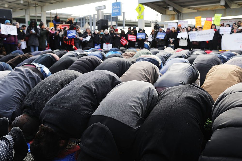 6b69d339cgettyimages-633701152-jpg.jpeg Muslim men pray at a prayer and demonstration at JFK airport to protest President Donald Trump's immigration ban, February 3, 2017 <br>