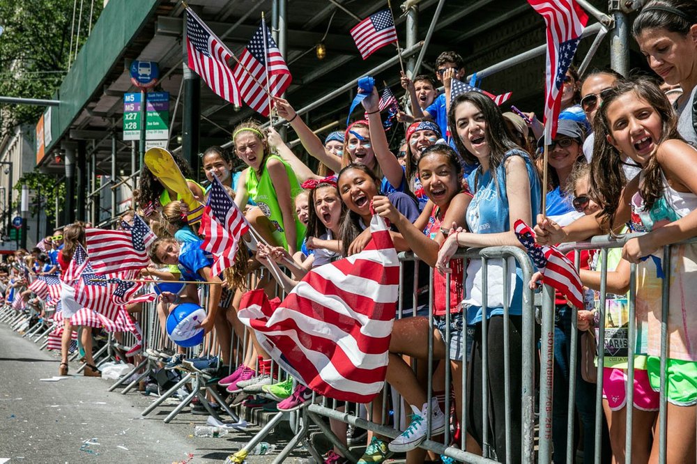 6dc3464ab0829f79ca-jpeg.jpeg Fans line the street during the 2015 parade for the USWNT (Tod Seelie / Gothamist)