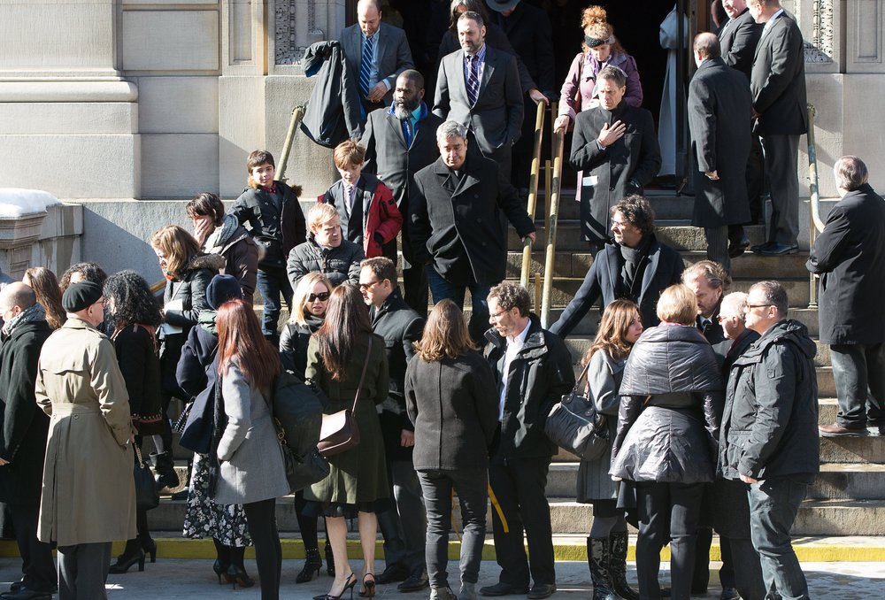 6f7093193.jpeg Mourners outside the church