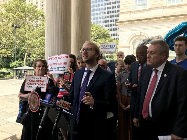 Naftuli Moster, executive director of Yaffed, at a rally on Wednesday at City Hall to demand the de Blasio administration ensure that yeshiva students recent an adequate education.
