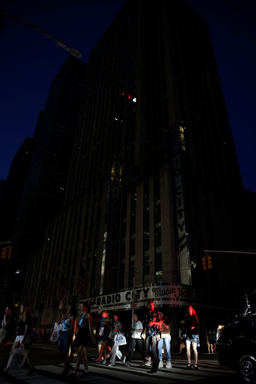 7bb6d7748shutterstock_10333913d-jpg.jpeg People outside Radio City Music Hall (JASON SZENES/EPA-EFE/Shutterstock)