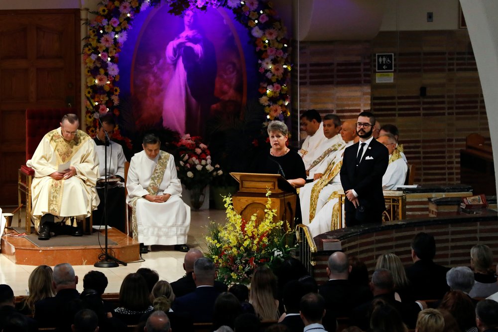 800dbeb2ashutterstock_10327150d-jpg.jpeg Aida Lugo speaks during the funeral Mass for her brother Detective Luis Alvarez at Immaculate Conception Church in Queens. (Richard Drew/AP/Shutterstock)