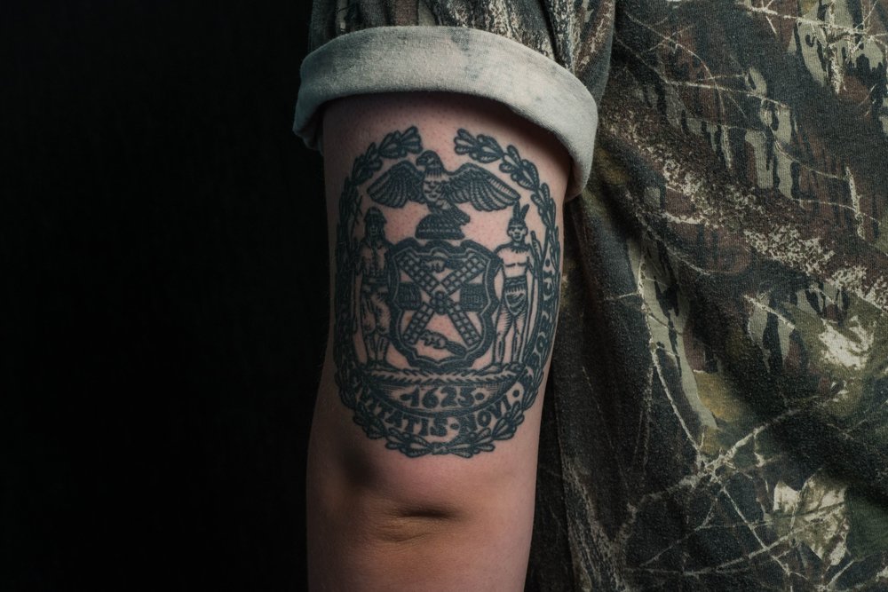 8505e4a8cwwarren-6-jpg.jpeg William Warren also got a tattoo of the seal of New York, by Rob Banks, after he moved to Maine<br>