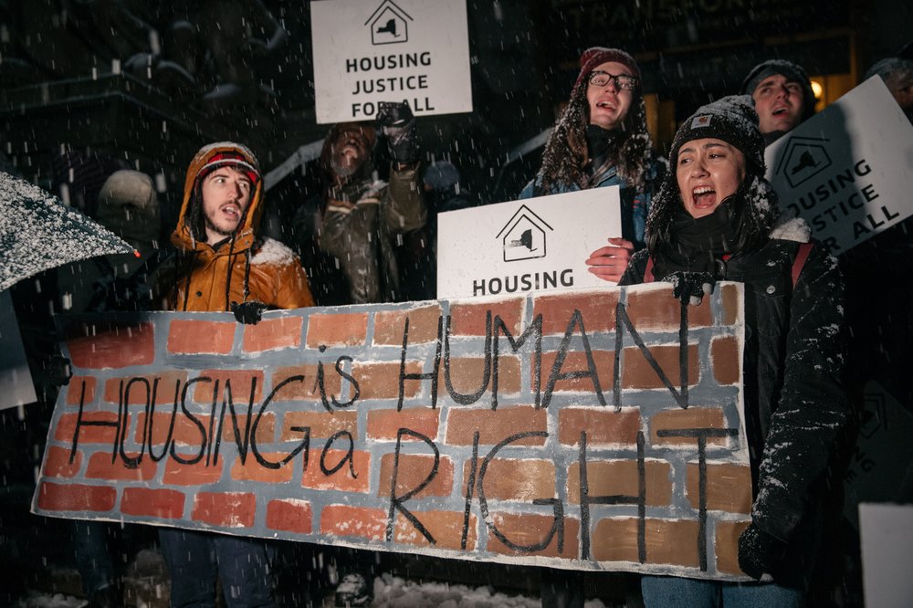8703d502f111618cuomohousingcrisismarchsnow-7-jpg.jpeg