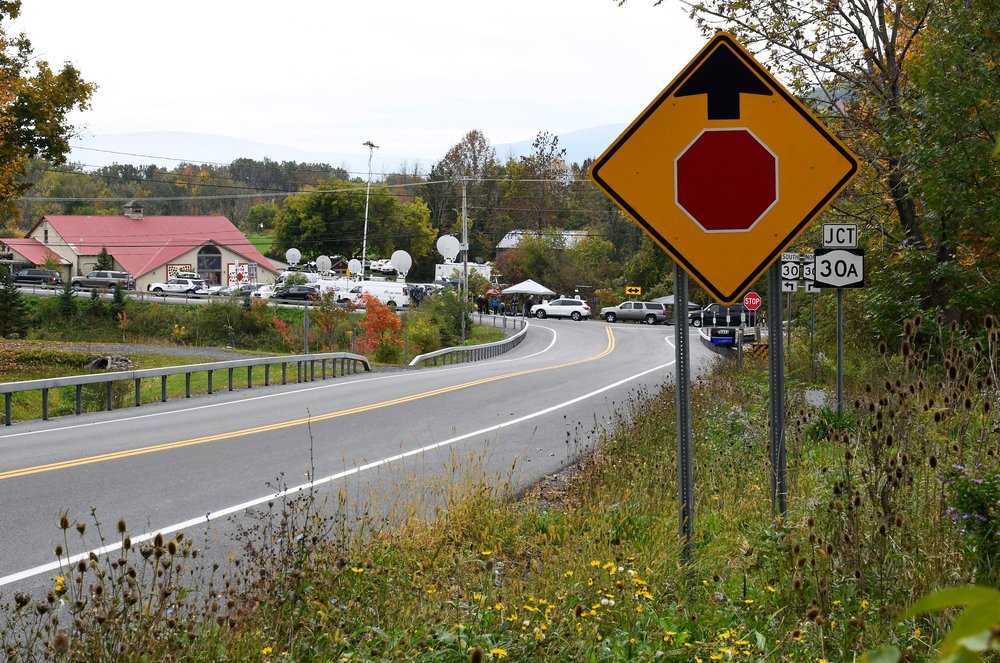 87bc97305shutterstock_9918339f-jpg.jpeg Television networks broadcast at the roadside memorial scene of Saturday's fatal limousine crash in Schoharie, N.Y., . A limousine loaded with people headed to a birthday party blew the stop sign at the end of a highway and slammed into an SUV parked outside a store, killing all people in the limo and a few pedestrians, officials and relatives of the victims said.<br>
