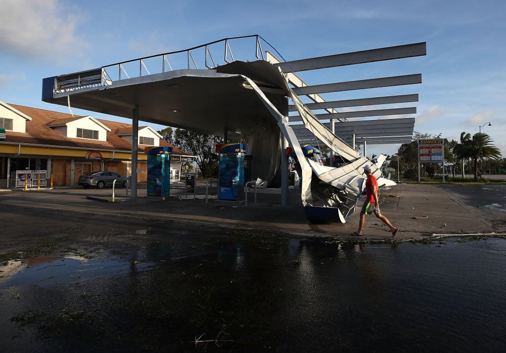 88222dfb2gettyimages-845610870-jpg.jpeg The roof of a gas station is shown damaged by Hurricane Irma winds on September 11, 2017 in Bonita Springs, Florida. (Getty)