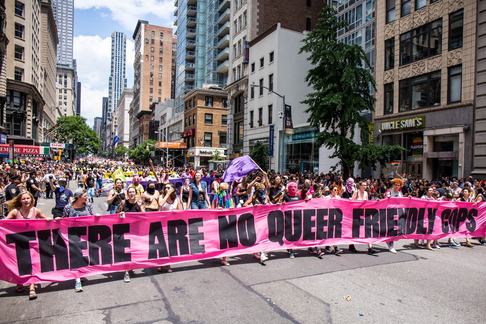 88992214cpridearrests-2-jpg.jpeg Earlier in the parade, the group marched with this banner<br>