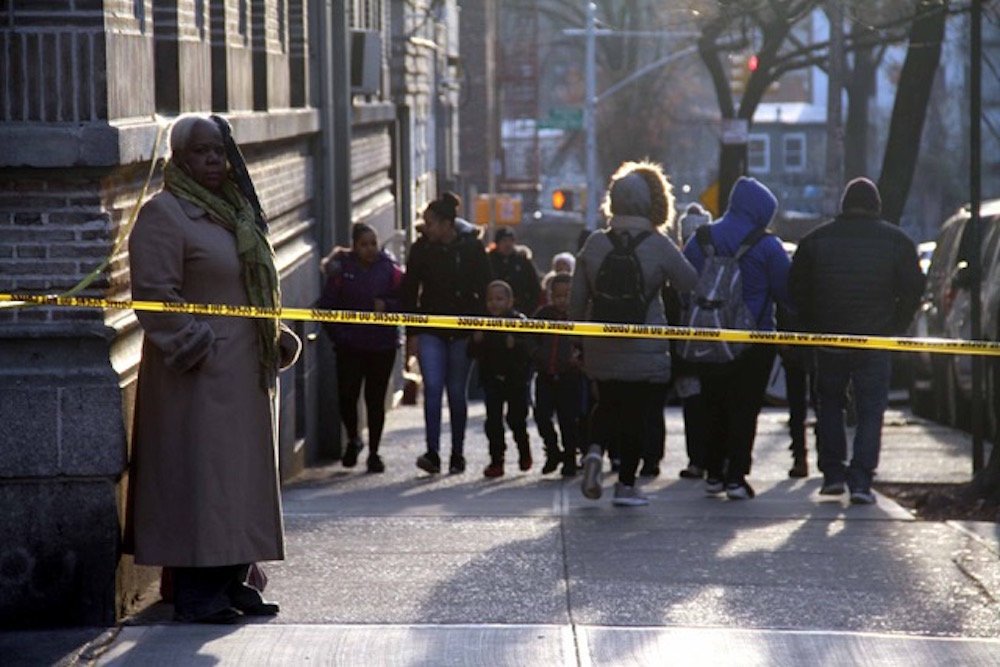 89bcfd6abloring-7-jpeg.jpeg The hustle and bustle of the morning commute is disrupted by crime scene tape at West 183 Street and Loring Place North. (Photo by David Greene / Gothamist)