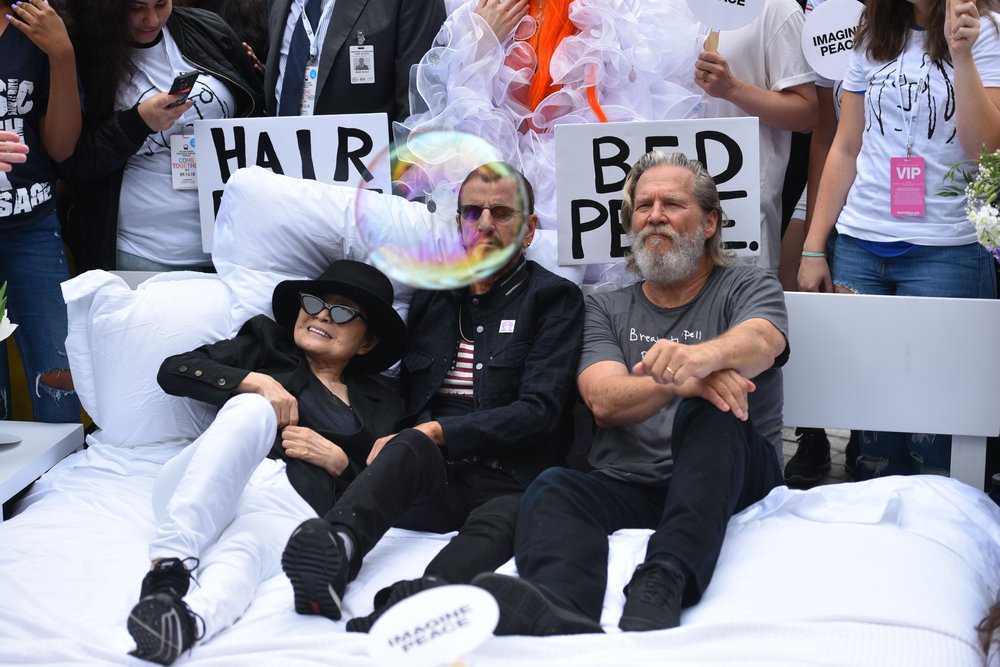 8ae9a17f4shutterstock_9881357aa-jpg.jpeg Yoko Ono, Ringo Starr and Jeff Bridges (MediaPunch/Shutterstock)