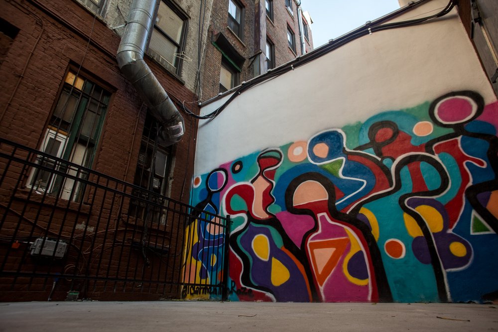 8b50573cc101817firstavenue1600-9-jpg.jpeg A newly-installed mural in the backyard of 194 First Avenue clashes with the buildings' older fixtures.<br>