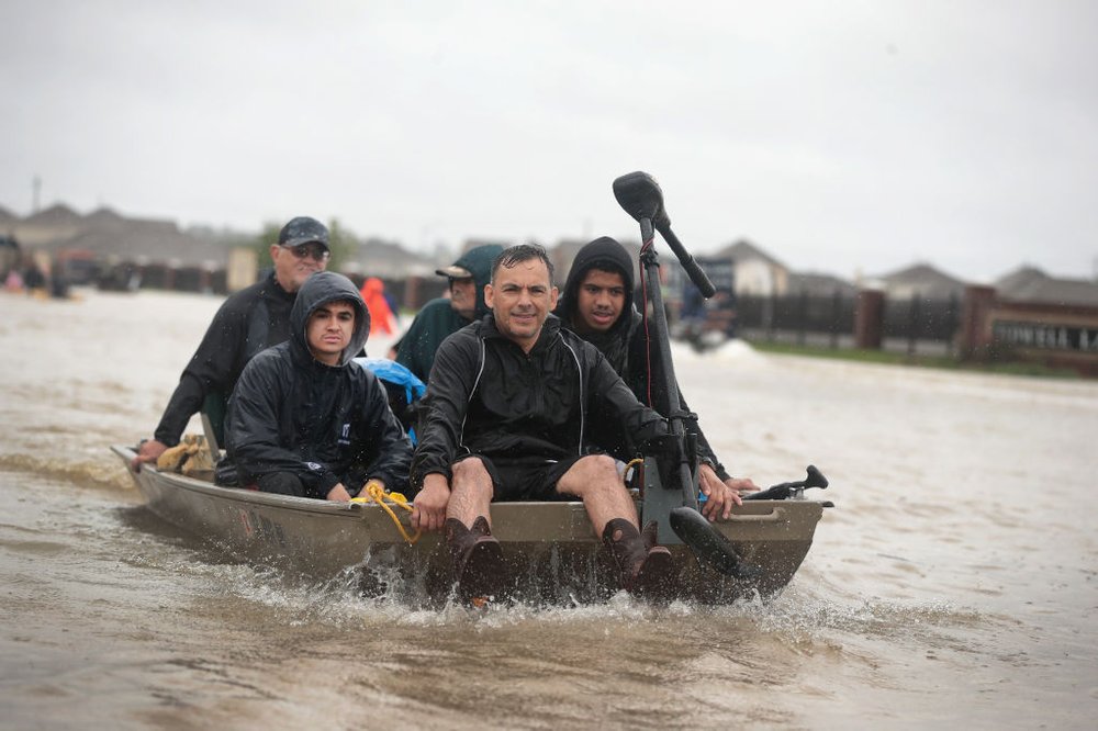 8e053b62agettyimages-840308504-jpg.jpeg People are rescued from a flooded neighborhood after it was inundated with rain water, remnants of Hurricane Harvey, on August 28, 2017 in Houston, Texas<br>