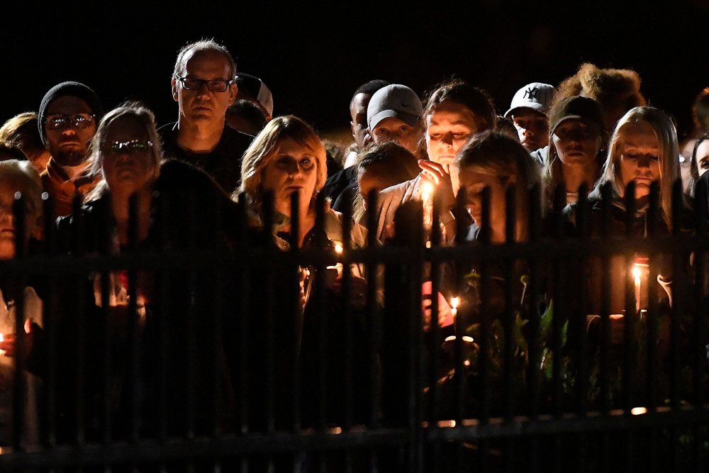 8eef53699shutterstock_9918686b-jpg.jpeg Family members and friends gather for a candlelight vigil memorial at Mohawk Valley Gateway Overlook Pedestrian Bridge in Amsterdam, N.Y., . The memorial honored 20 people who died in Saturday's fatal limousine crash in Schoharie, N.Y<br>