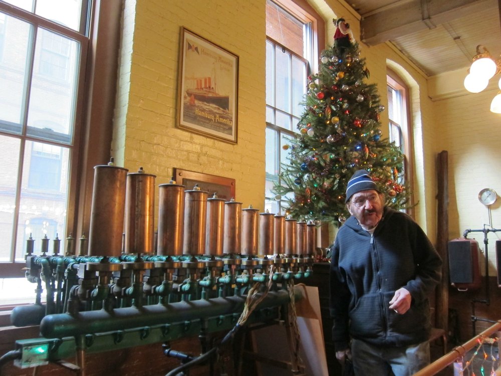 9031b9b06.jpeg Chief Engineer Conrad Milster with his handmade calliope<br/>