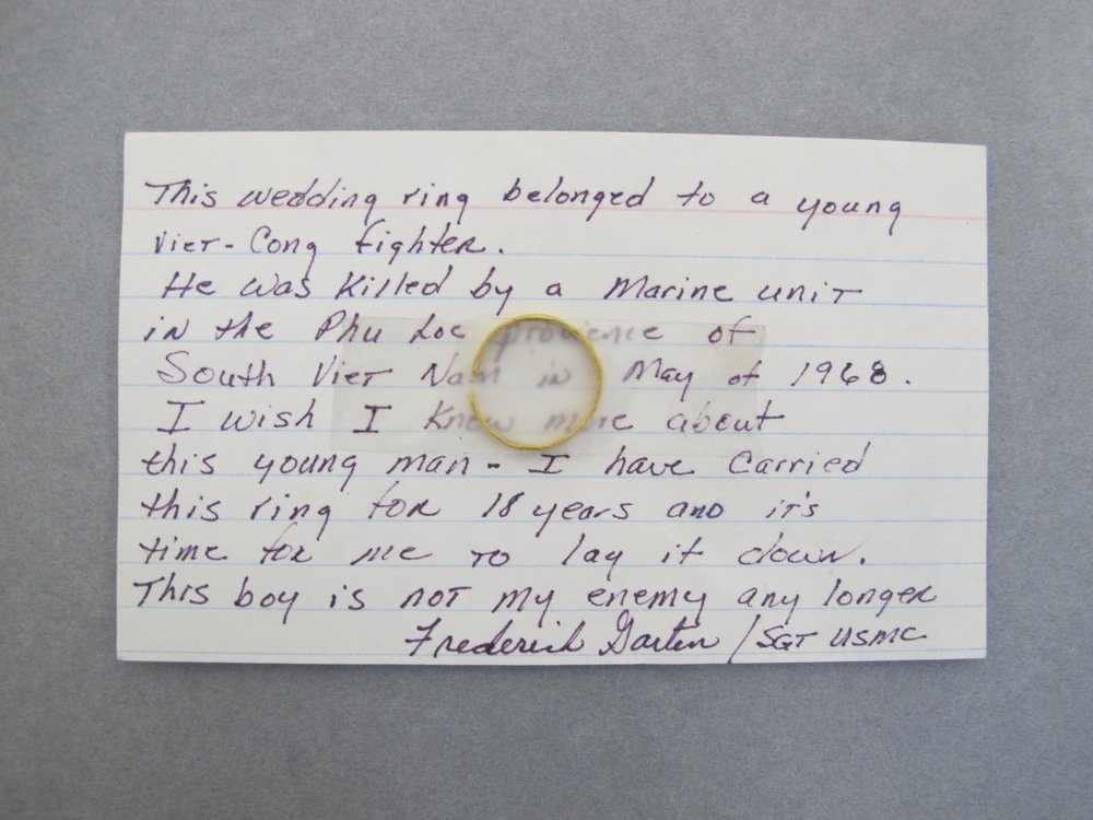 924ee346518-vietnam-veterans-memorial-note-and-wedding-ring-jpg.jpeg Index card with ring left at the Vietnam Veterans Memorial in Washington, DC. Courtesy of the National and Memorial Parks, NPS<br/>