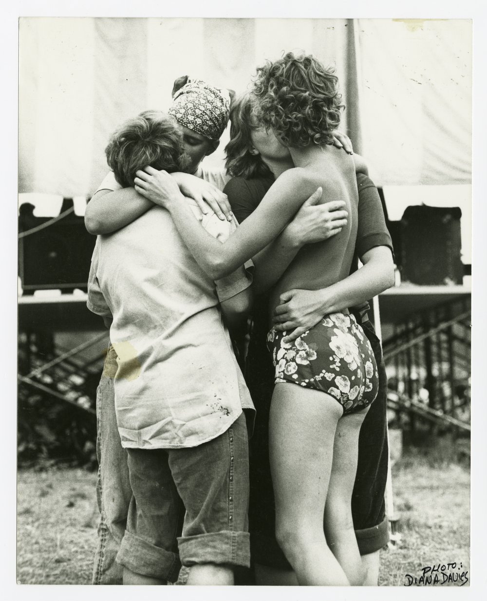 Women embracing at Michigan Womyn’s Music Festival, 1976. Photo by Diana Davies.<br/>