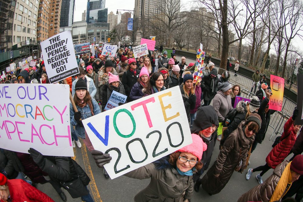 People participating in the NYC Women's March (William Volcov/Shutterstock)