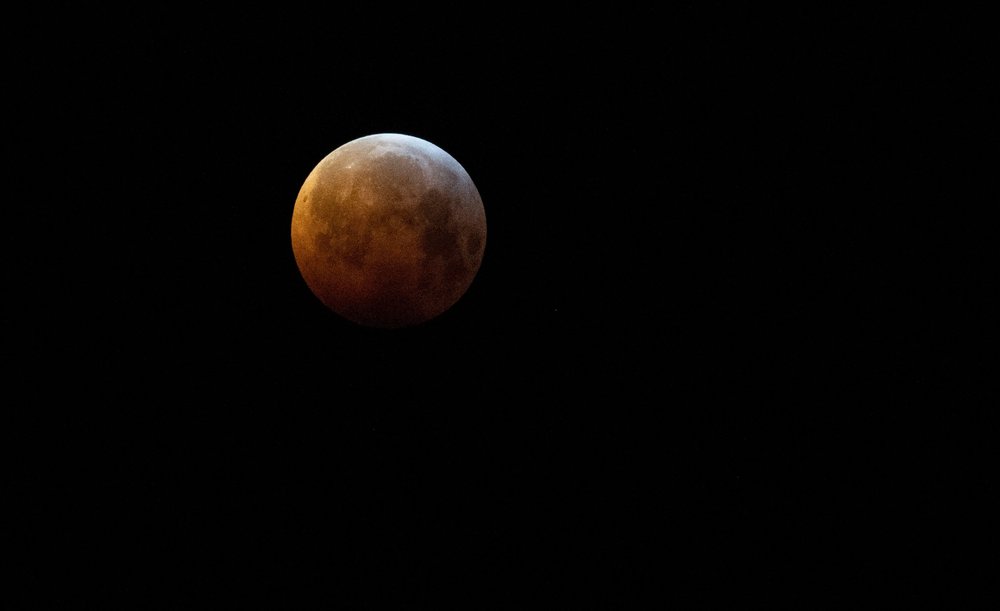 9679ea906shutterstock_10069623c-jpg.jpeg Lunar eclipse at 00.32am EST viewed from Brompton Regis, Exmoor National Park, Somerset, England (Shutterstock)