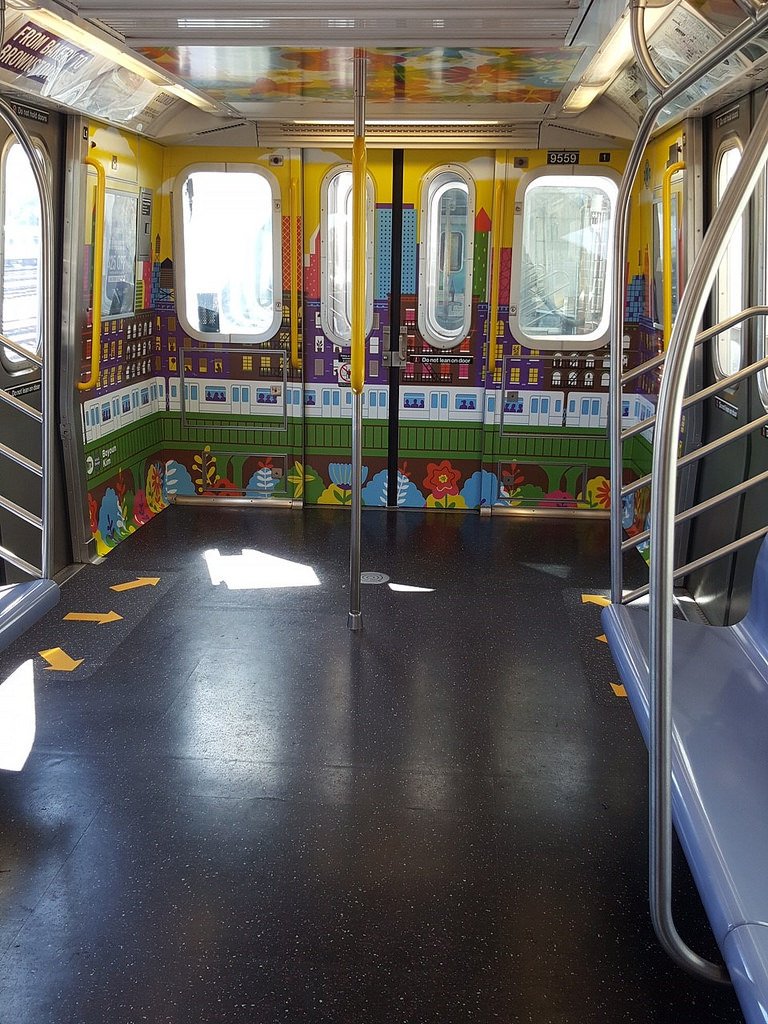 9a547fbb937217732460_b51ee15b7e_b-jpg.jpeg Seats were taken out at the end of the subway cars for more standing room. <br>
