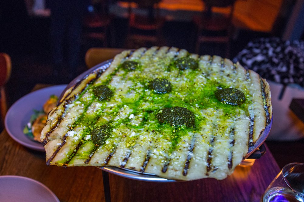 Atwells broccoli and pistachio pesto grilled pizza<br/>