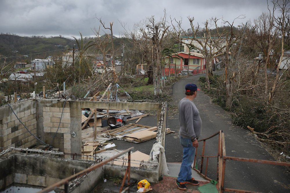 9b5794483092517gettypuertorico15-jpg.jpeg Telesforo Menendez surveys the damage in his neighborhood on Sunday, September 24th in Hayales de Coamo, Puerto Rico. (Joe Raedle/Getty Images)