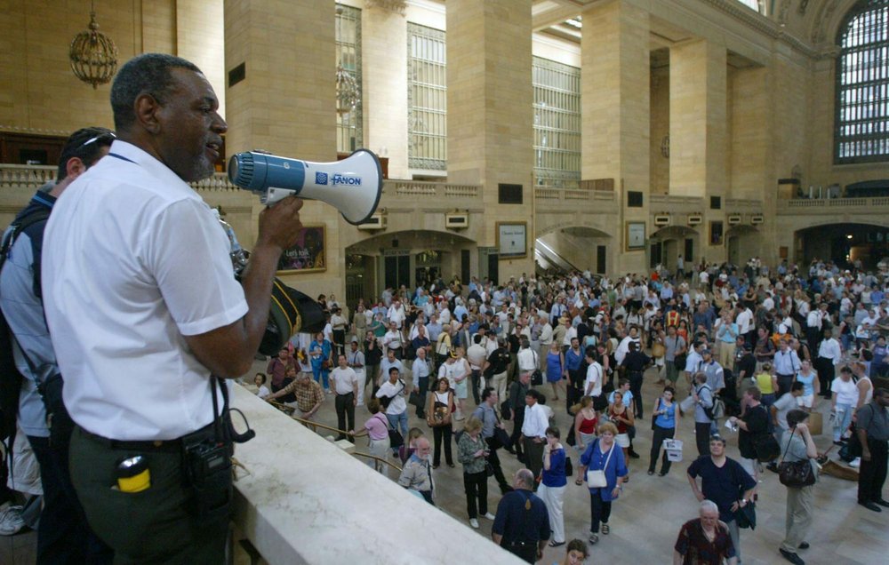 Officials try to direct passengers at Grand Central Terminal (Jason Szenes / EPA/Shutterstock)