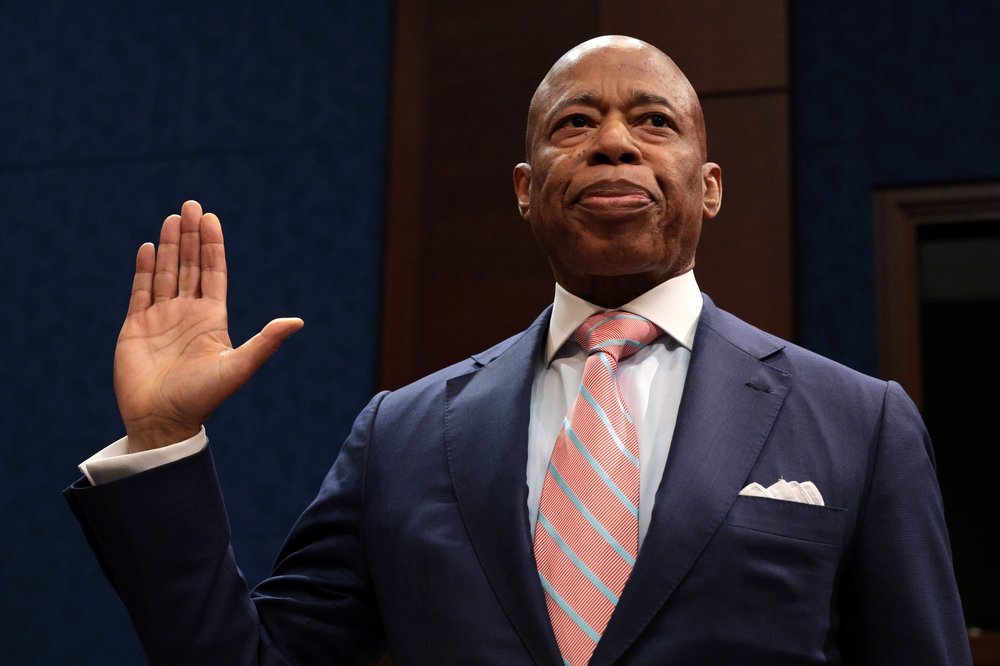 A photo of Mayor Adams being sworn in to testify before Congress.