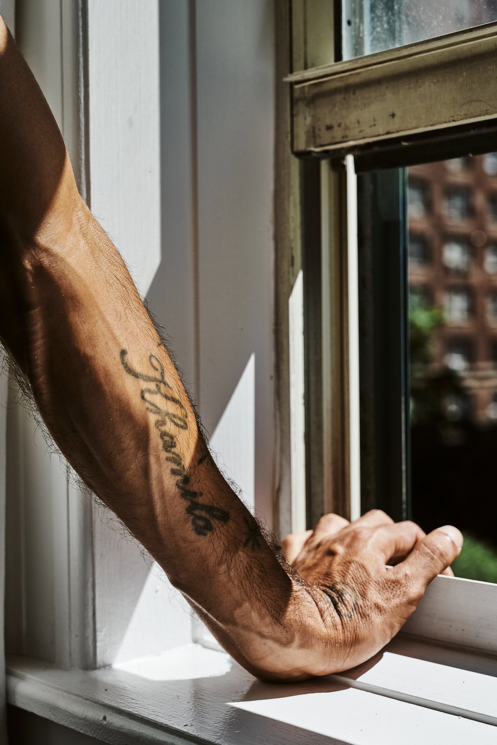 The uncle has his daughter’s name tattooed on his arm. She stayed in Venezuela.