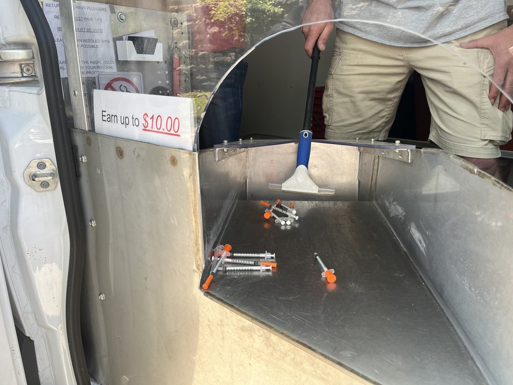 New Yorkers can earn up to $10 per day collecting used needles through the city's new syringe buyback program.