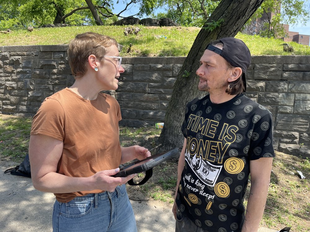 Allie Hunter, a cofounder of Addiction Response Resources, signs up Keith Garcia for the syringe buyback program outside Echo Park.